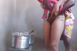 I sneaked into her kitchen whiles she was busy preparing dinner and I gave her a hot banged.
