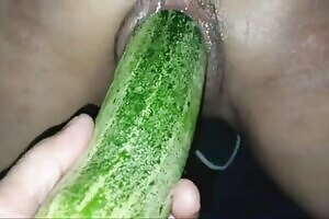When a young nurse masturbates, she plays with a cucumber and stuffs it into her pussy until her clit is wet.
