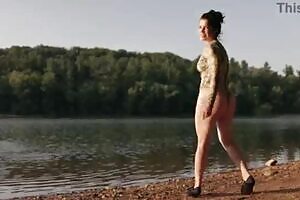 Thong bodysuit at the lake