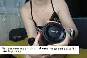 Anna unbox a male masturbator from XSpaceCup and milks her husband's dick while he kisses her feet
