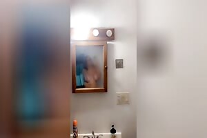 Squeezing tits in mirror