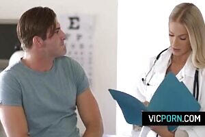 Hot blonde doctor Emma Hix fucks with her patient after she caught him fapping