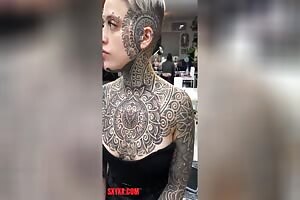 This incrdible, hypnotic bodyneckface tattoo...