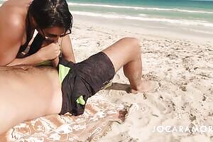 Be sneaky...I treat my boyfriend on the public beach!